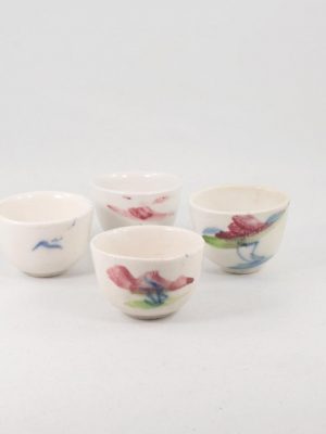 Antique Miniature Tea Cup in White Porcelain Flower Design