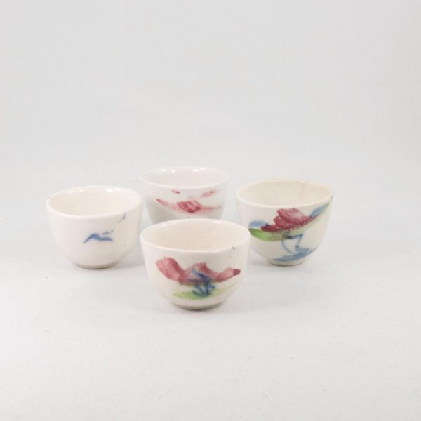 Antique Miniature Tea Cup in White Porcelain Flower Design