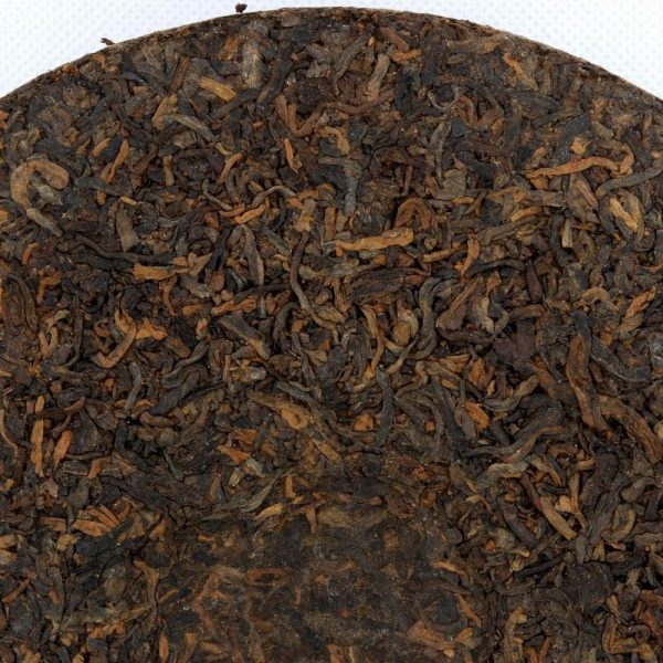 Pu-Erh Tea Cake "Iron Mold", Golden Tips (Jin Ya), Chuan Long Factory, 2003 (Cooked/Shou)